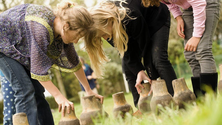 Playing a traditional game of 'Kayling' at Trerice, Cornwall